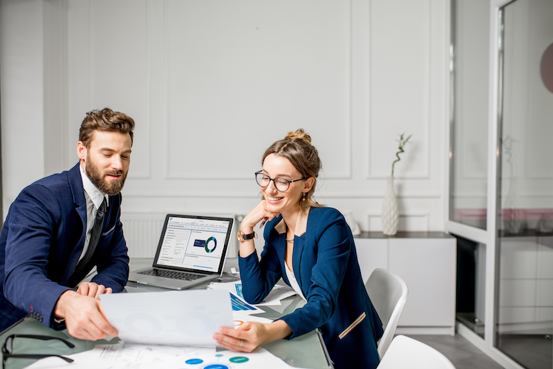 AdobeStock_185719079 financial services co-workers using accounting seed