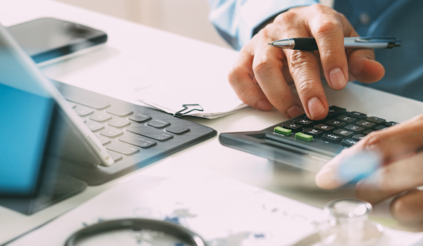 man using calculator